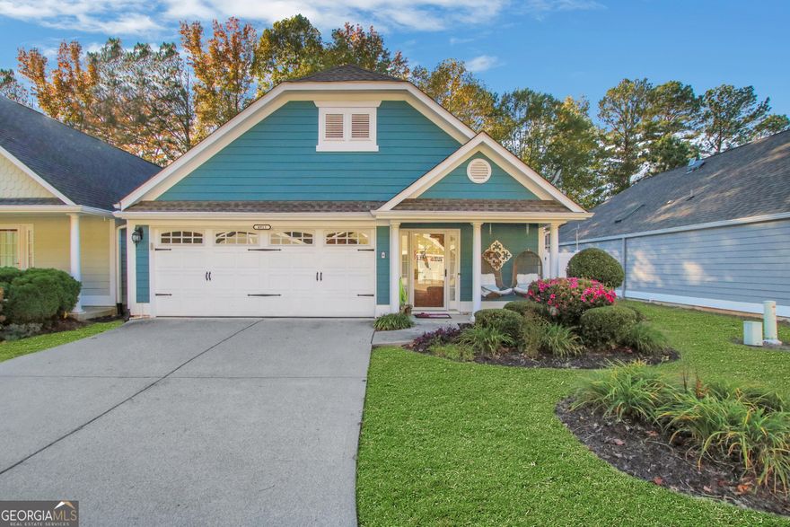 Welcome home to Magnolia Cottage! This beautifully maintained gated community is just one mile from Downtown Acworth and two miles from Lake Acworth! This 2-bedroom, 2-bath cottage is the largest floor plan in the neighborhood and features an enclosed sunroom, soaring 12-foot ceilings, and a wide-open layout perfect for easy, single-level living.    Step inside to find new paint, updated light fixtures, and new faucets throughout. The kitchen shines with LG stainless steel appliances (only 3 years old), an oversized single-basin sink with a custom tray system (cutting board, drying rack, rinse tray), and a new garbage disposal. The gas fireplace with classic stone surround anchors the main living area, creating a cozy focal point under tall ceilings and abundant natural light.    The oversized owner's suite has hardwood floors, a walk-in shower, and plenty of space to unwind. Both bathrooms feature new toilets (2022), and the home's mechanical systems have been meticulously maintained, roof replaced 5 years ago, hot water heater refurbished 3 years ago, and the HVAC system is serviced annually and in excellent condition.    Step outside to your private side yard with a 6' x 40' vinyl fence, complete with paver patio for outdoor dining and a gravel dog run in back, perfect for pets or play.    Additional perks include: HOA covers water, trash, and landscaping, keypad entry for both the front and garage doors, two gate remotes included, 220V outlet ready for an electric vehicle, stepless entry with no stairs anywhere!    Take your golf cart to the lake or downtown in minutes and enjoy all that Acworth has to offer restaurants, shops, and lakeside relaxation just around the corner.    This is easy, comfortable living at its finest! Move-in ready and meticulously cared for.    Welcome home to Magnolia Cottage!