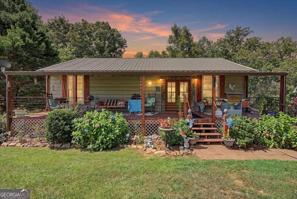 Photo of 5119 E Highway 166, Carrollton, GA 30116 (MLS # 10829152)