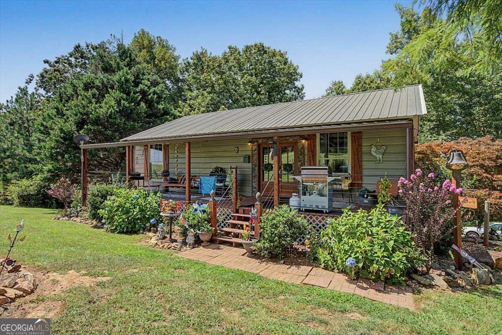 Photo of 5119 E Highway 166, Carrollton, GA 30116 (MLS # 10829152)