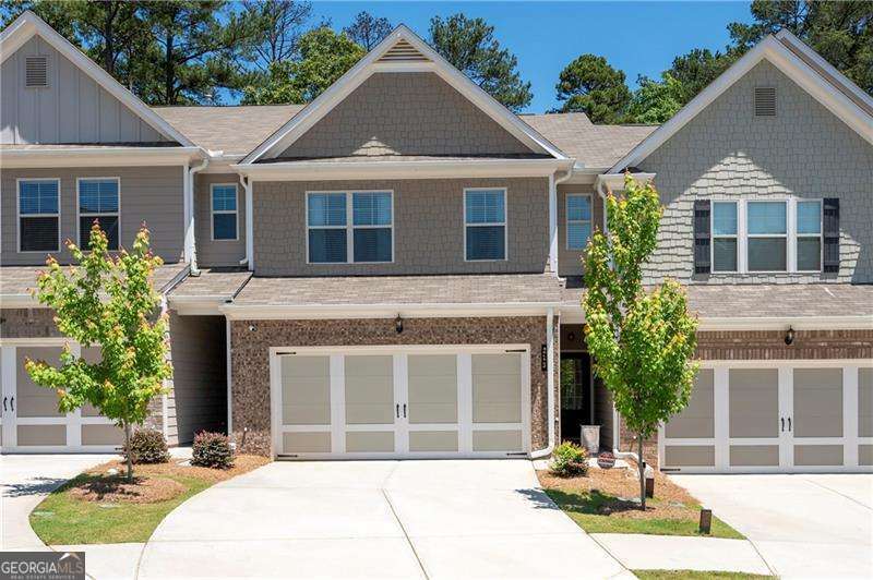 PRICE REFRESH - Now $425,000! Welcome to 213 Yellowwood Way, where charm, space, and location come together in one incredible opportunity! Nestled in the heart of Woodstock, this beautifully maintained home offers everything today's buyers are searching for-at a newly reduced price that won't last long! Step inside to find a bright and open layout with spacious living areas, high ceilings, and tons of natural light. The kitchen is perfect for entertaining with ample counter space, stainless steel appliances, and a seamless flow into the family room. Enjoy generously sized bedrooms, including a luxurious owner's suite with a spa-like bath and walk-in closet. The private backyard is ideal for relaxing or hosting friends, and the community amenities add to the lifestyle-swimming, tennis, trails, and more. Located just minutes from downtown Woodstock, top-rated schools, dining, and shopping, this is the home you've been waiting for-and at just $425K, it's the best value in the neighborhood! Schedule your private showing today before it's gone!