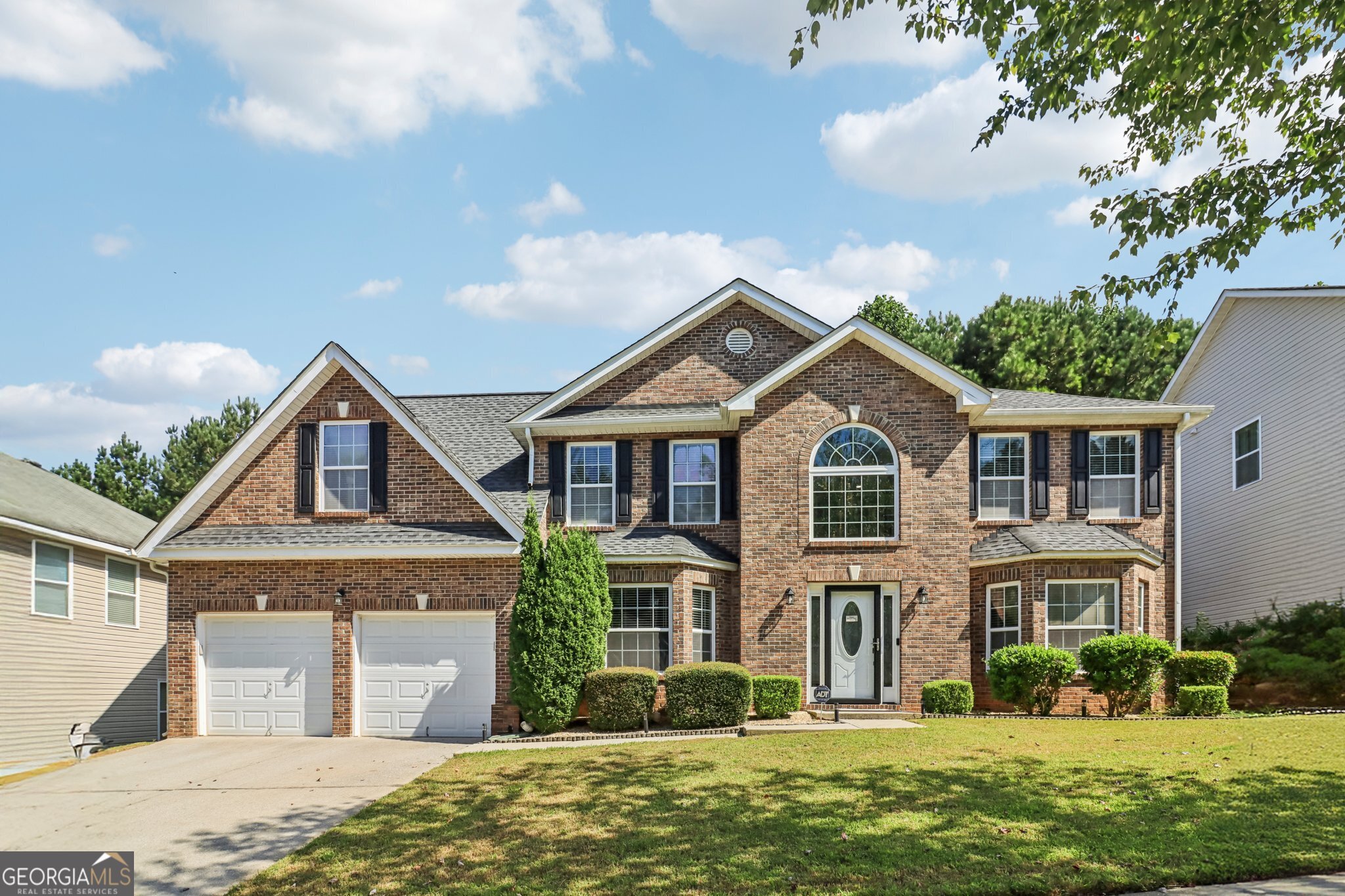 Welcome to this beautifully updated 5-bedroom, 3-bathroom home in Snellville, GA, where modern upgrades meet everyday comfort. From the moment you step inside, you'll notice thoughtful details and stylish finishes that make this home truly move-in ready. The primary suite upstairs is a relaxing retreat featuring a large black ceiling fan with remote, installed less than a year ago. All bathrooms have been refreshed with new faucet fixtures, updated lighting in two of the three bathrooms, and upgraded toilets that are just two years old. The kitchen is a chef's delight with modern cabinet hardware, a smart touch-activated faucet, recessed lighting, and a sleek refrigerator. Additional updates include a foyer chandelier, recessed lighting in the laundry room and upstairs hallway, and durable black LVP flooring throughout. Practical upgrades extend into the garage, which now features brand-new metal pegboards for organized storage. Every room has been fitted with new ceiling fans, adding comfort and energy efficiency. This home offers a perfect blend of style, function, and convenience-all in a great Snellville location close to schools, shopping, and dining.
