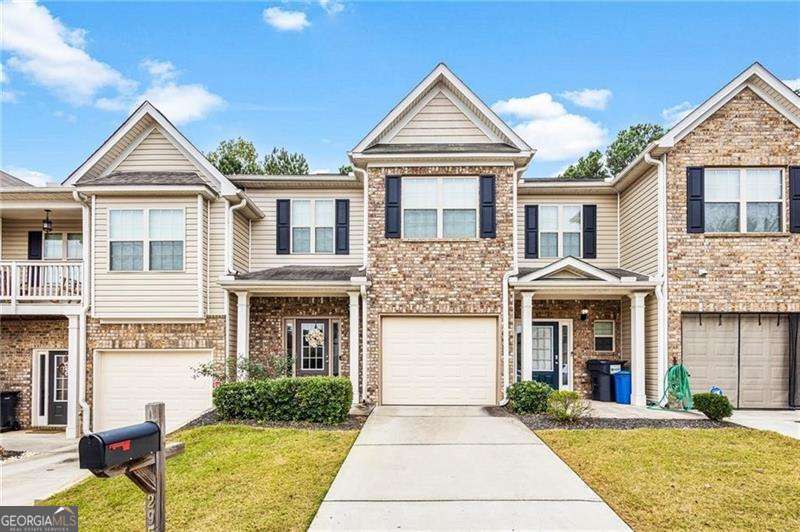Modern Comfort Meets Value in Austell - Priced to Sell at $265,900 Welcome to 295 Sweetshrub Drive, a beautifully maintained townhome offering modern finishes, smart layout, and unbeatable value in one of Austell's most accessible neighborhoods. Built in 2018, this spacious 3-bedroom, 2.5-bath home delivers just under 1,700 square feet of open, light-filled living space designed for the way you live today. From the moment you step inside, you're greeted by a seamless flow between the living and dining areas, ideal for both entertaining and everyday living. The kitchen shines with granite countertops, ample cabinetry, and a convenient bar top perfect for casual dining or your morning coffee. Upstairs, the oversized primary suite features a tray ceiling, walk-in closet, and private bath-offering a serene retreat at the end of the day. Two additional bedrooms and a full bath complete the upper level, with a half bath conveniently located on the main floor. Outside, the lot offers more space than most townhomes, giving you room to garden, grill, or simply enjoy the Georgia sunshine. With a brick-accented exterior and timeless curb appeal, this home blends low-maintenance living with classic style. Set in a quiet community just minutes from major interstates, local schools, and shopping, this home checks all the boxes for first-time buyers, downsizers, or investors looking for strong rental potential. Priced below recent estimates and move-in ready, it's a rare opportunity you don't want to miss.