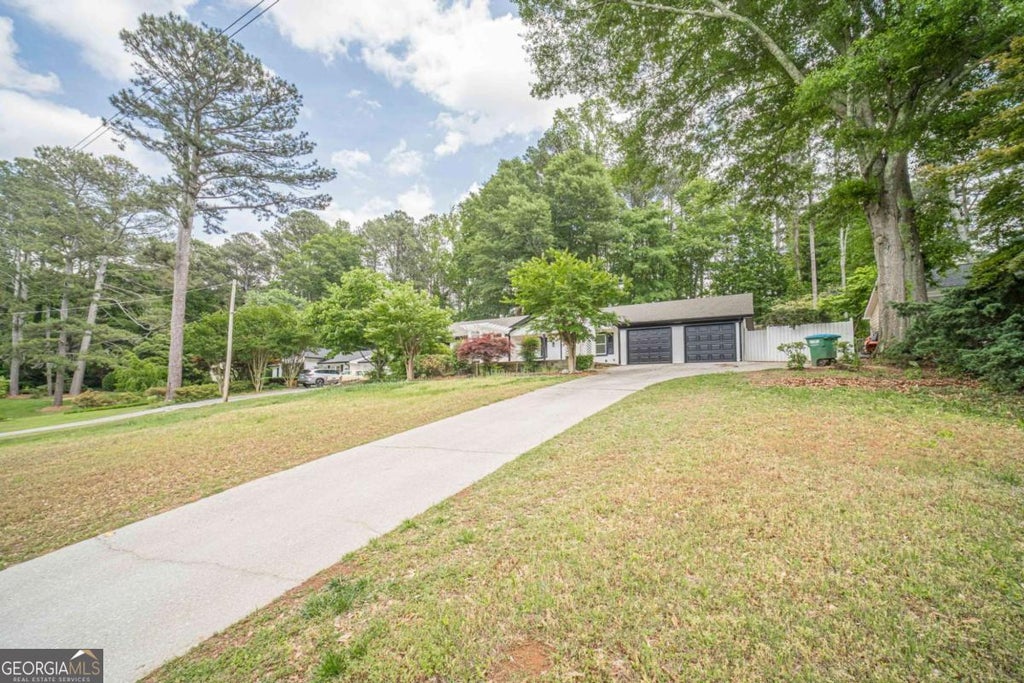 Photo of 4858 Tarleton Drive SW, Lilburn, GA 30047 (MLS # 10785169)