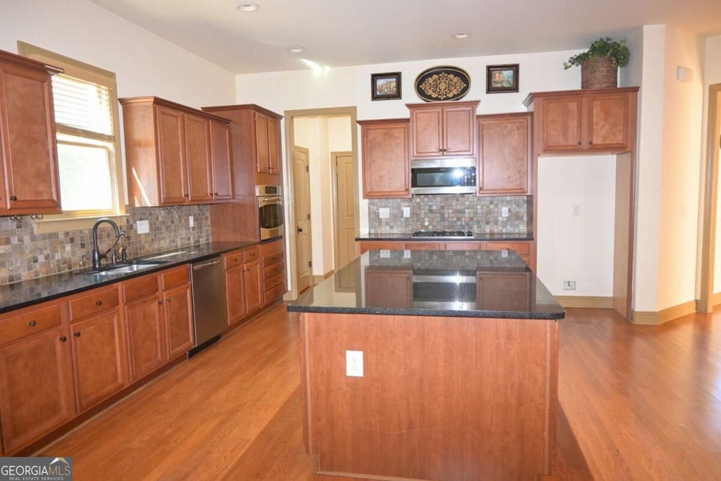 Photo of 3719 Baxley Ridge Drive, Suwanee, GA 30024 (MLS # 10878420)