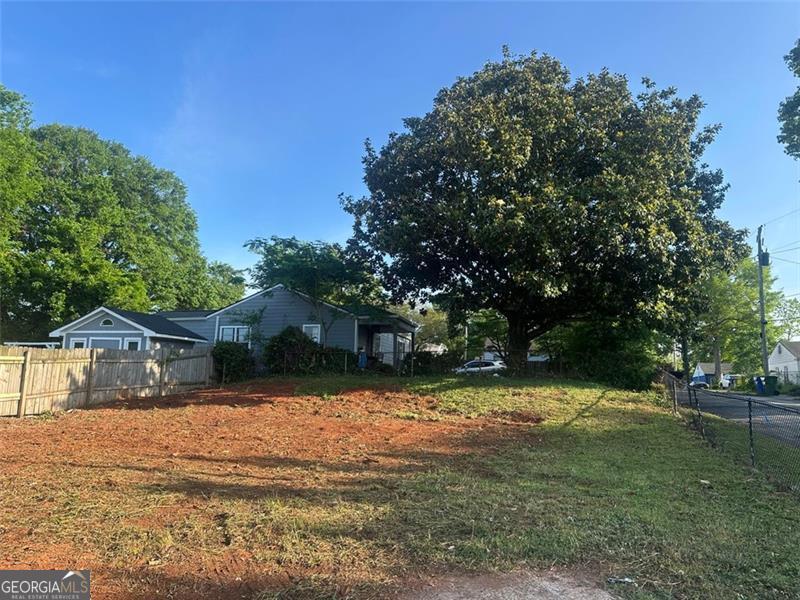 This R5-zoned parcel offers a blank canvas for developers and investors seeking to capitalize on the area's growth. With public water and sewer services available, the lot is ready for immediate development. Surrounding properties have seen significant renovations, with recent sales indicating a strong market demand. This property is ideally situated near major transportation routes, providing easy access to downtown Atlanta and other key areas. The neighborhood is experiencing revitalization, making this lot an attractive opportunity for new construction projects. Whether you're looking to build a single-family home or explore other development options, Hipp St. offers the potential to contribute to the area's transformation.