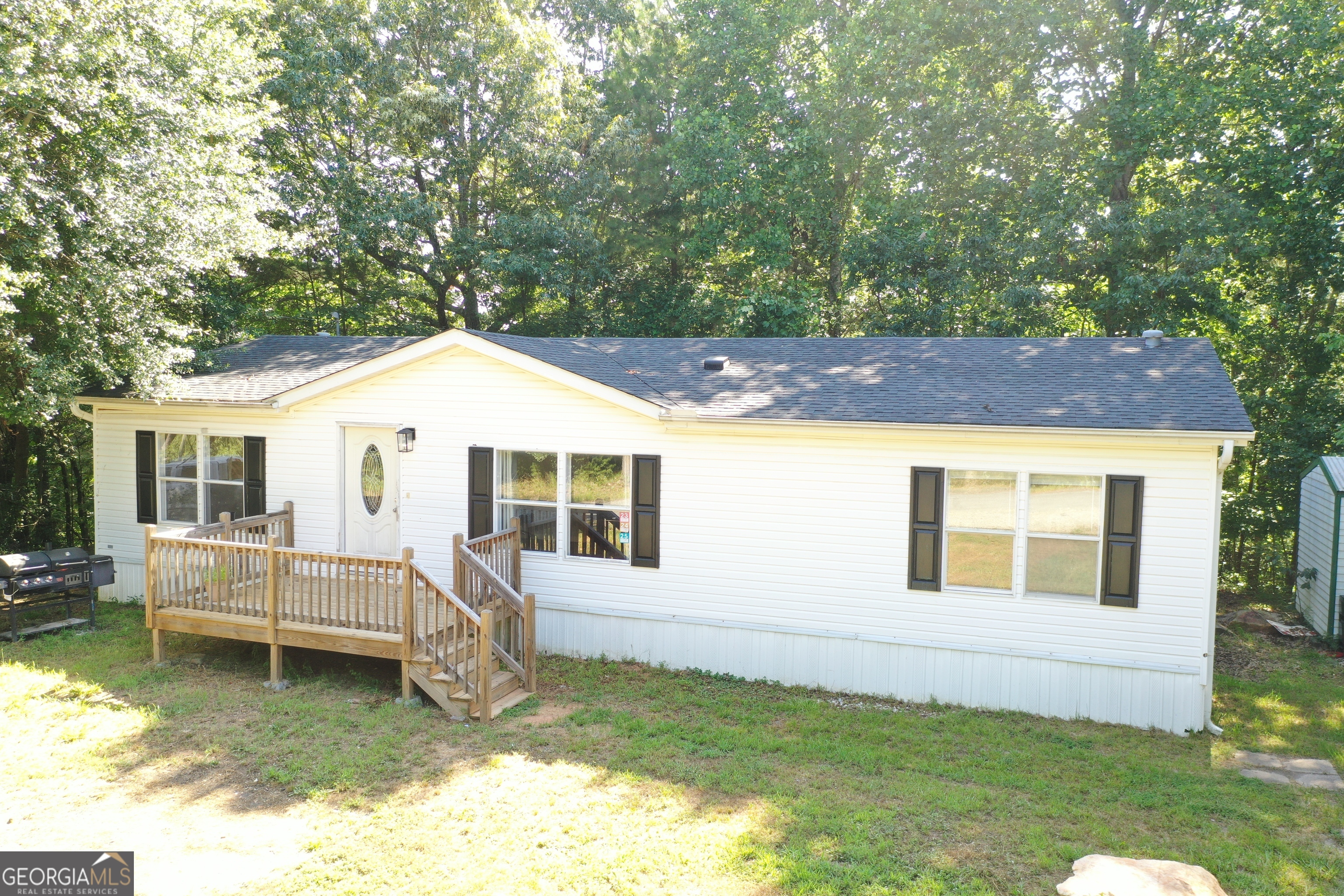 Back on the market at no fault of the seller. Discover comfort and convenience in this beautifully remodeled 3-bedroom, 2-bathroom mobile home located in the heart of Toccoa, GA. Offering 1,456 square feet of updated living space, this home sits on a spacious 0.55-acre lot, providing the perfect blend of peace and accessibility. Inside, you'll find a bright, open floor plan with fresh paint, new flooring, and modern finishes throughout. The kitchen features updated cabinetry and appliances, flowing seamlessly into a cozy living and dining area-ideal for family gatherings or entertaining guests. The primary suite boasts a spacious layout, while two additional bedrooms and a full second bath provide plenty of room for a growing family or home office setup. Located just minutes from downtown Toccoa, you'll enjoy quick access to shopping, dining, schools, and local attractions-all while enjoying the comfort of your own quiet property.