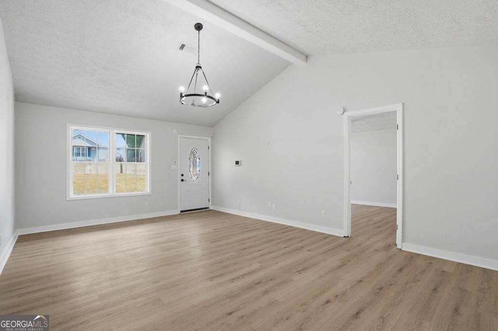 Photo of 9127 Clubhouse Drive, Riverdale, GA 30274 (MLS # 10740613)