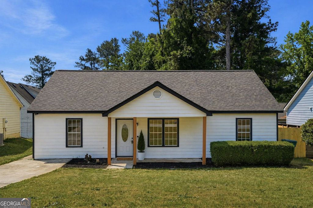 Photo of 9127 Clubhouse Drive, Riverdale, GA 30274 (MLS # 10740613)