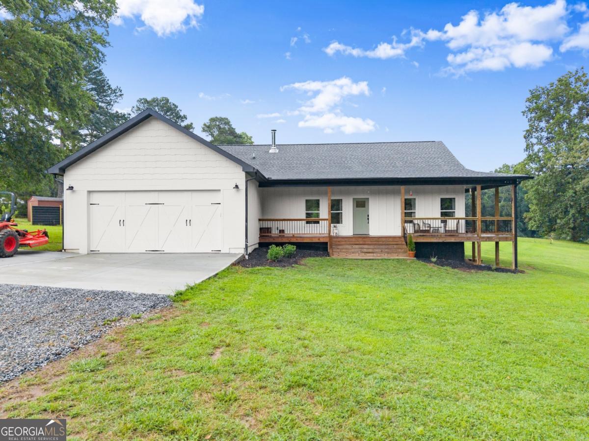 Welcome to your own slice of heaven! This charming 3-bedroom, 2-bathroom open-concept farmhouse sits 600 feet off the road, offering unmatched privacy and tranquility on a fully fenced +/-6-acre property. Step inside to find a bright and airy layout perfect for cozy living or entertaining. The heart of the home flows effortlessly from kitchen to living space, with picturesque views out every window. Outside, the magic continues! Enjoy a tree-lined creek with big open skies year round perfect for stargazing, sunrises, and sunsets. This property is being sold as a turn-key homestead with chickens, a barn, and fencing already in place. With pasture-ready land-bring your animals and make it your own! Whether you're looking to embrace farm life, enjoy a peaceful retreat, or simply soak up nature's beauty, this ready-to-go homestead has it all!! WELCOME HOME! *$1,200 lender credit to be used towards buyers closing costs or rate buy down with use of preferred lender**