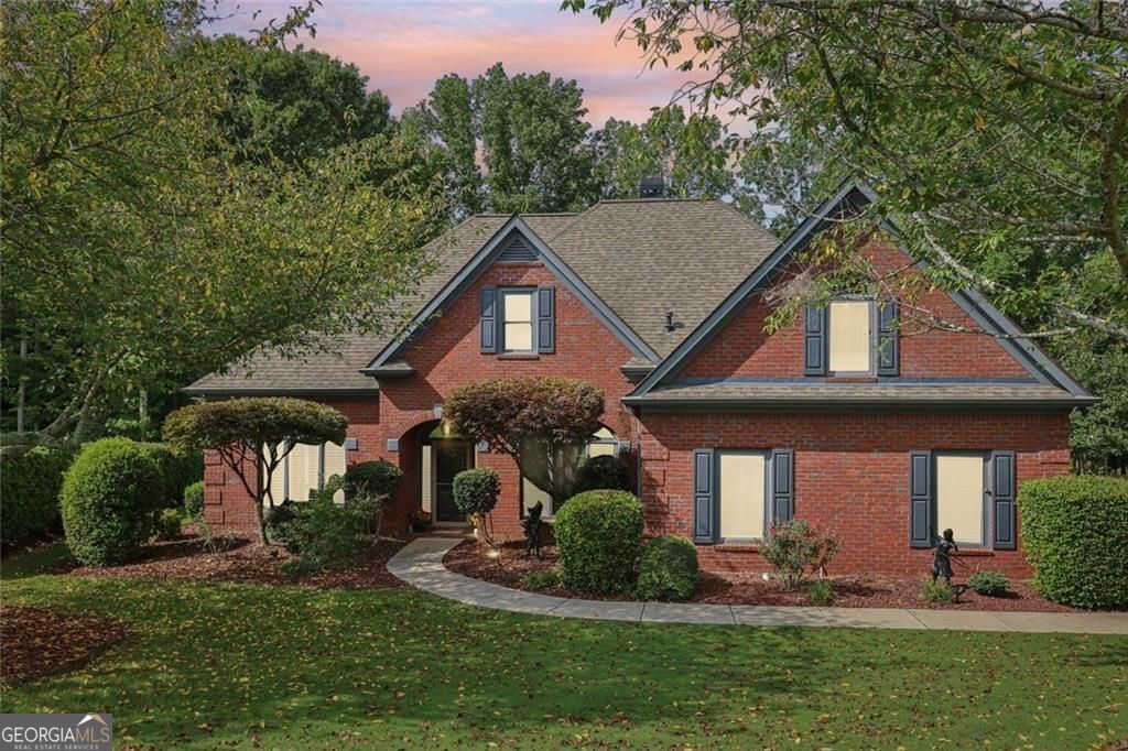 Incredible Opportunity to Live in the Sought After Golf, Swim, Tennis Community of Polo Golf and Country Club! This 4BR/3.5 Bath Ranch Home is 3 Sides Brick and Sits on an Incredible 1+ Acre Private Lot! This Bright Open Floorplan Has Been Meticulously Maintained and Boasts Grand Ceilings, Gorgeous Wide Plank Hardwood Floors, New Architectural Roof, New Pella Windows, New Dual HVAC System, New Hot Water Heater, Custom Blinds and Plantation Shutters. This Wonderful Split Bedroom Plan Offers Privacy and Convenience with Two Guest Suites that Share a Full Bath off Main and a Private Bonus/4th Bedroom Up w/Private Bath That Makes a Perfect Teen Suite or Media Room! Chef's Kitchen w/Dual Ovens, Built-in Microwave, Separate Gas Cooktop, Custom Cabinets, Tiled Backsplash, Granite Countertops, Island, Breakfast Bar, Pantry and View to Cozy Keeping Area w/Fireplace. Vaulted Sun Room/Breakfast Area w/Ceiling Fan. Vaulted Great Room w/Dual Sided Fireplace, Curves Archway, Ceiling Fan and Deck Access and Fabulous Backyard Views. Spacious Master Suite with Dual Tray Ceiling, Fan, Bay Windows w/Spectacular Backyard Views. Master Spa w/Custom Dual Vanity, Granite Countertops, Tiled Floor, Jetted Tub, Separate Shower and Large Walk-in Closet. Large Den/Office w/French Doors and Coffered Ceiling. Formal Dining Room w/Column Accents, Elevated Tray Ceiling and Chandelier. The Backyard is Perfect for and Relaxing with It's Two Oversized Decks and Electric Sunsetter Deck Awning. Relish in Your Personal Oasis as You Overlook the Private Fenced Backyard with Beautiful Scenic Views!