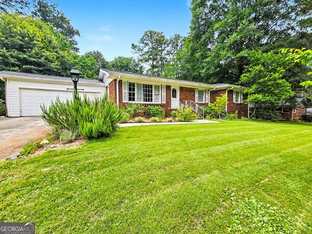 Photo of 3665 Chavers Place, Stone Mountain, GA 30083 (MLS # 10792180)