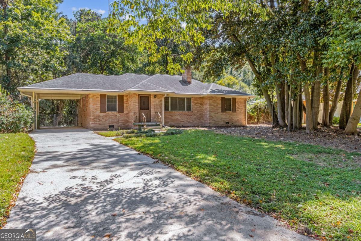 Location, Location, Location! Endless possibilities await with this incredible opportunity in prime North Buckhead. This four-sided brick ranch, featuring 3 bedrooms and 2 full baths, sits on just over a third of an acre and is ready for your vision-whether you remodel or tear down to build your dream home. Perfectly situated in the highly sought-after Sarah Smith Elementary, Sutton Middle, and North Atlanta High School cluster, with several top private schools nearby. Enjoy the convenience of being able to walk to the Blue Heron Nature Preserve and just a short drive to Chastain Park, upscale shopping, dining, and entertainment. No HOA restrictions-just unlimited potential in one of Atlanta's most desirable neighborhoods!