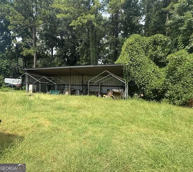 Photo of 5714 Hwy 42, Ellenwood, GA 30294 (MLS # 10849786)