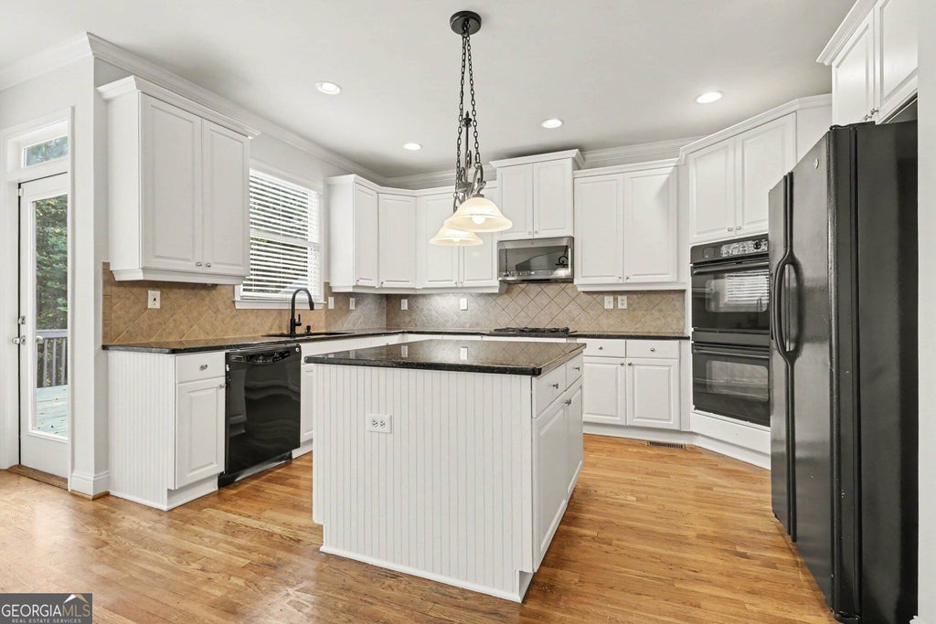 Photo of 1955 Blossom Creek Lane, Cumming, GA 30040 (MLS # 10848852)