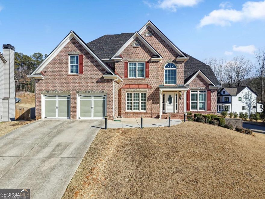 Discover your dream home in this stunning 6-bedroom, 4-bathroom retreat, nestled in a peaceful neighborhood with no HOA and surrounded by newly built homes. Recently painted and thoughtfully designed, this property offers the perfect blend of elegance, comfort, and functionality.    The grand two-story foyer leads to formal sitting and dining areas, ideal for hosting. Gorgeous hardwood floors flow throughout the main level, where the heart of the home shines in the chefCOs kitchen. Enjoy granite countertops, stainless steel appliances (including double ovens), a large island, and a cozy breakfast nook. A main-level bedroom with a full bath is perfect for guests.    Step outside to a nearly new screened-in porch overlooking the spacious, flat backyardCoideal for entertaining, relaxing, or even adding a pool. Upstairs, the oversized primary suite features tray ceilings, a sitting room, a spa-like ensuite with dual vanities, a soaking tub, a separate shower, and a custom walk-in closet. Two additional bedrooms with walk-in closets share a Jack-and-Jill bath.    The fully finished basement offers endless possibilities: a large game room, an in-law suite with a kitchen, three flexible bonus rooms for a home theater or gym, and an extra bedroom with a full bathroom.    A covered back deck, double-car garage, and convenient access to interstates, shopping, and dining complete this home. Move-in ready and designed for making lasting memoriesCoschedule your showing today!
