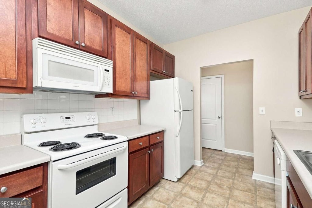 Photo of 8606 Thomas Lane, Riverdale, GA 30274 (MLS # 10837598)