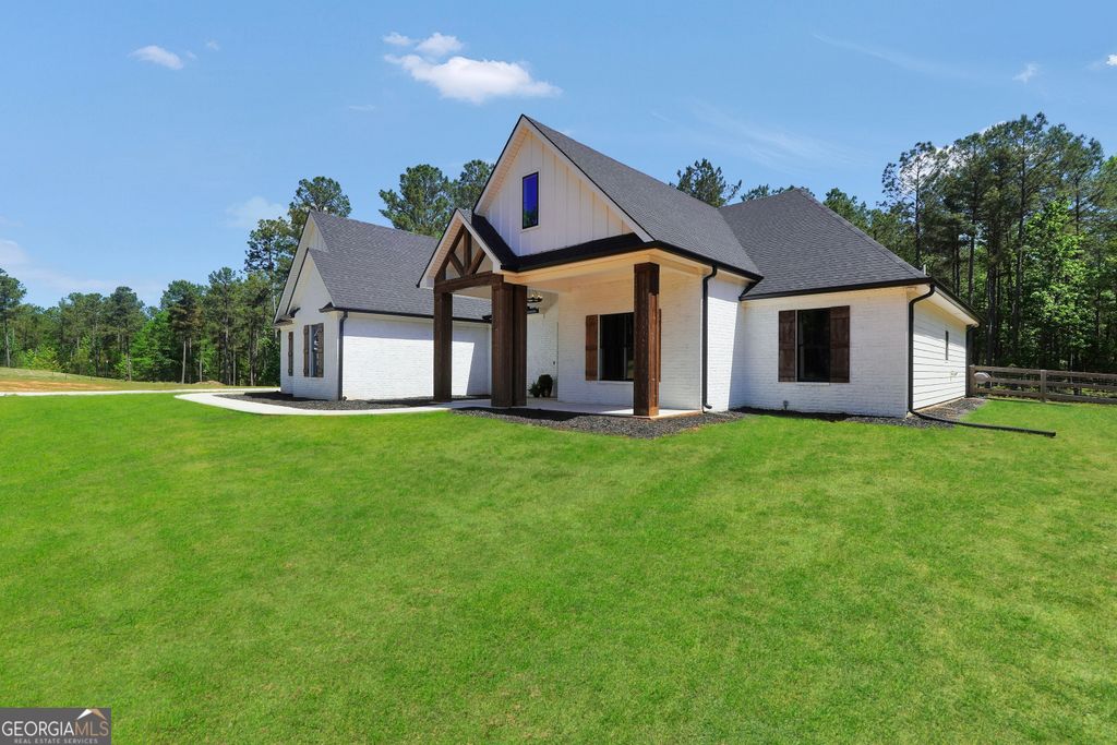 Photo of 787 Silver Dollar Road, Milner, GA 30257 (MLS # 10795857)