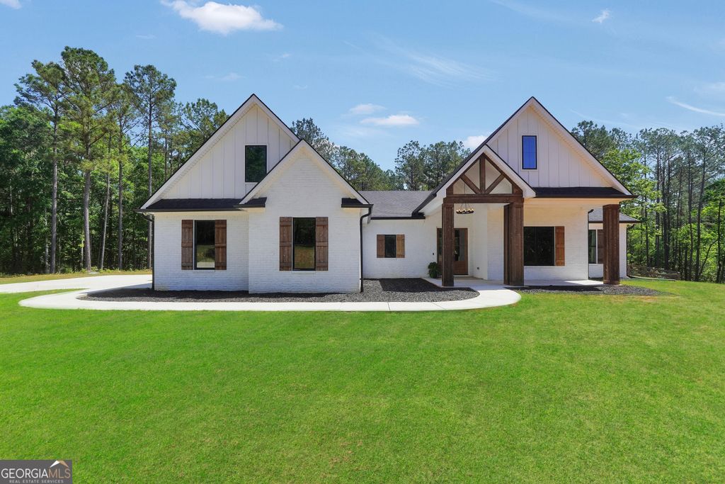 Photo of 787 Silver Dollar Road, Milner, GA 30257 (MLS # 10795857)