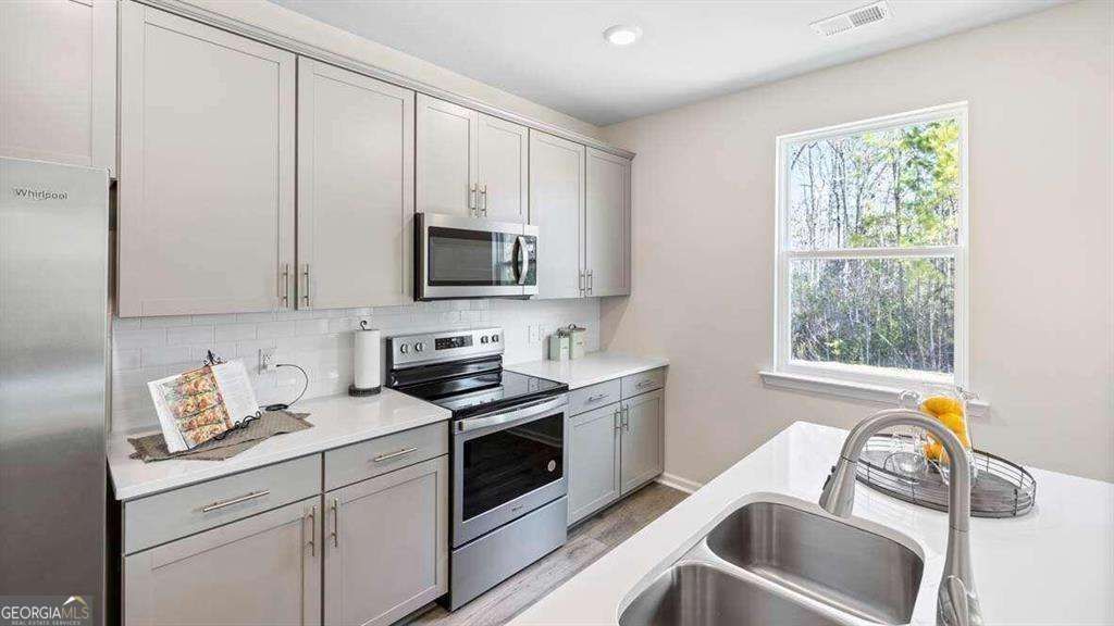 Photo of 249 Friendship Oak Way, Hampton, GA 30228 (MLS # 10764323)