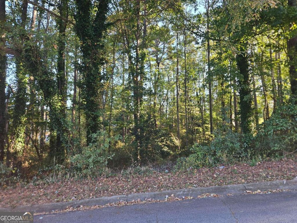 Photo of 3205 Alcazar Drive SW, Lilburn, GA 30047 (MLS # 10630517)