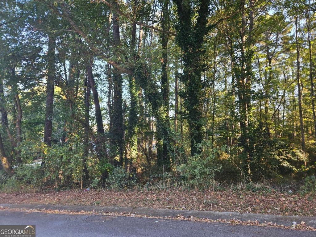 Photo of 3205 Alcazar Drive SW, Lilburn, GA 30047 (MLS # 10630517)