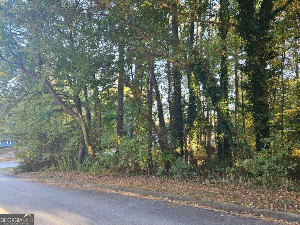 Photo of 3205 Alcazar Drive SW, Lilburn, GA 30047 (MLS # 10630517)