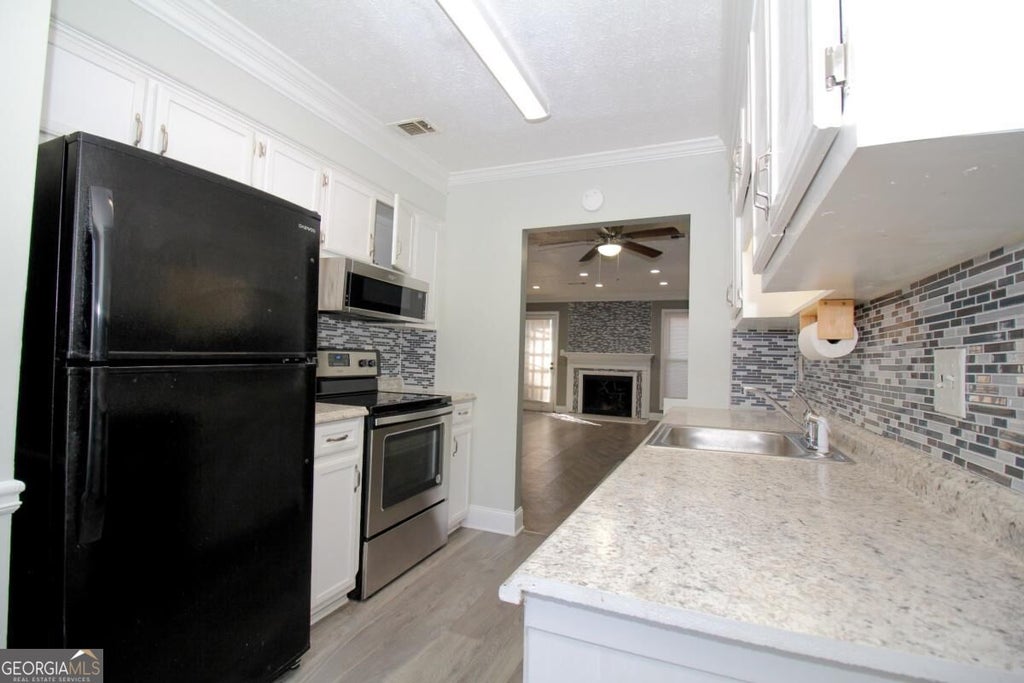 Photo of 2340 Beaver Ruin Road #UN7, Norcross, GA 30071 (MLS # 10846203)