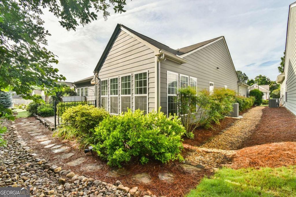 Photo of 6649 Burnt Hickory Drive, Hoschton, GA 30548 (MLS # 10773749)