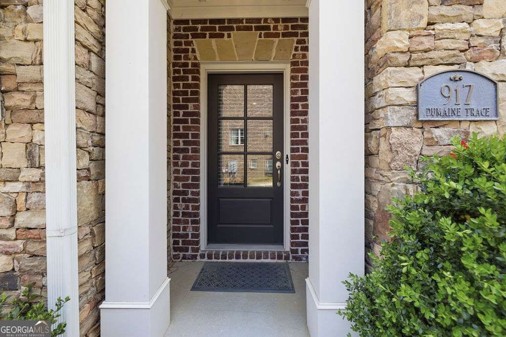 Photo of 917 Dumaine Trace, Atlanta, GA 30328 (MLS # 10725116)