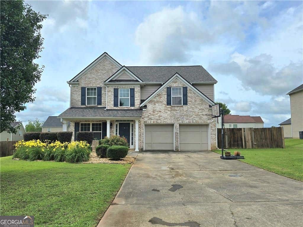 Photo of 227 Happy Trail, Locust Grove, GA 30248 (MLS # 10815772)