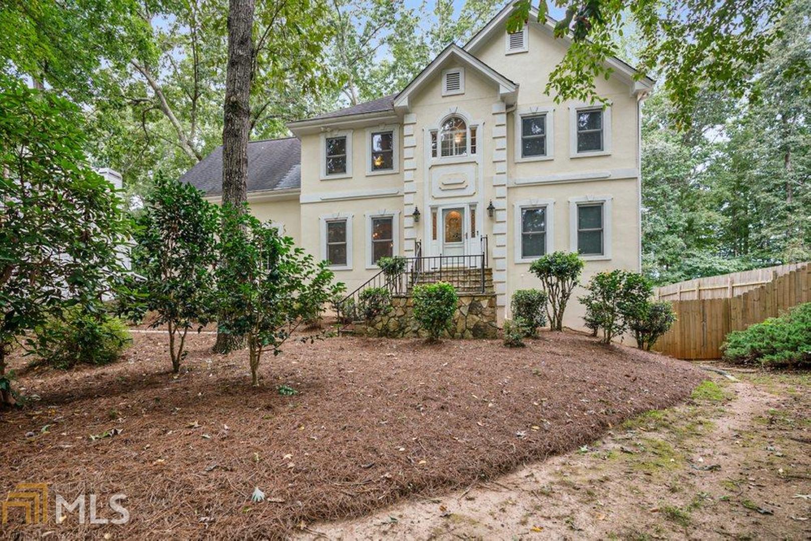 Don't miss this rare opportunity in Royal Oaks Estates! Large yards, unique homes with all Suwanee has to offer, parks, events, and highly rated North Gwinnett school cluster. This home offers space for in-laws or family members to enjoy private spaces for living, learning, or entertaining. The recently renovated en suite and large master bedroom provide room to relax. The large kitchen and informal dining area allow for entertaining and family time together. The finished basement offers a kitchen, bedroom, and full bath along with a separate entrance for multi-generational living. The large fenced backyard presents an opportunity to step back to nature and for kids to play safely.