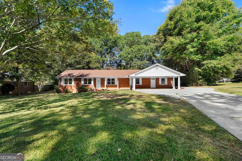 Photo of 143 McKinley Drive, Griffin, GA 30224 (MLS # 10879697)
