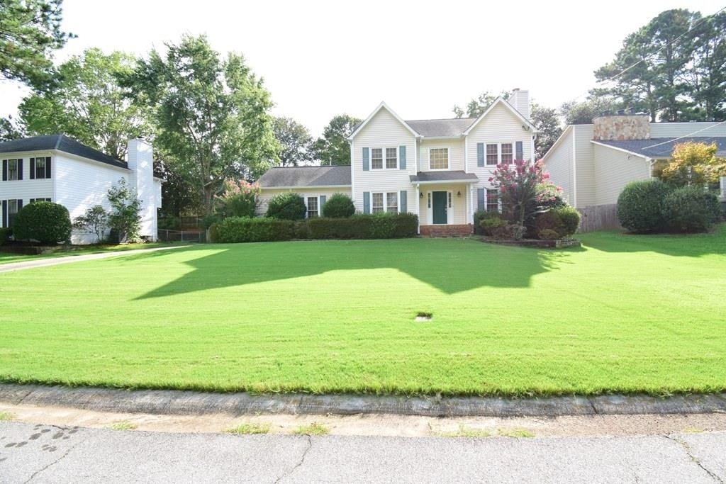 For rent! Lovely 2 story single family home with 4 bedrooms & 2.5 baths. Private fenced backyard with swing is ready for you to do some gardening. Level front yard and long drive way for extra parking besides the 2-car garage with 2 automatics openers. Large Trex deck for BBQ and entertaining. Grill included. Open to living room, there is a huge gourmet kitchen with granite counters, a big island, plenty of cabinets, stainless steel appliances including a very nice fridge, counter microwave and good size pantry. Separate dining room. Living room with fireplace has TV bracket ready for you above fireplace mantel and wired for speaker system. Extra living room on left as you enter the foyer can be an office. Upstairs has large master and 3 good size bedrooms with ceiling fans. Master bathroom is recently renovated with separate double tiled shower and frameless sliding glass doors, fancy-free standing tub ready for you to soak in, double vanities with quartz counter top, large walk-in closet and heated tiled ceramic floor, great for winter use. A very upscale luxury set of Samsung washer and dryer is also included in a good size laundry room. Good locations. Close to everything. Community has no pool or tennis but landlord pays for HOA fee for general upkeep of the neighborhood. There is a pool available to join with membership at a separate cost. Lawncare is included in the rent. It's vacant ready to move in.