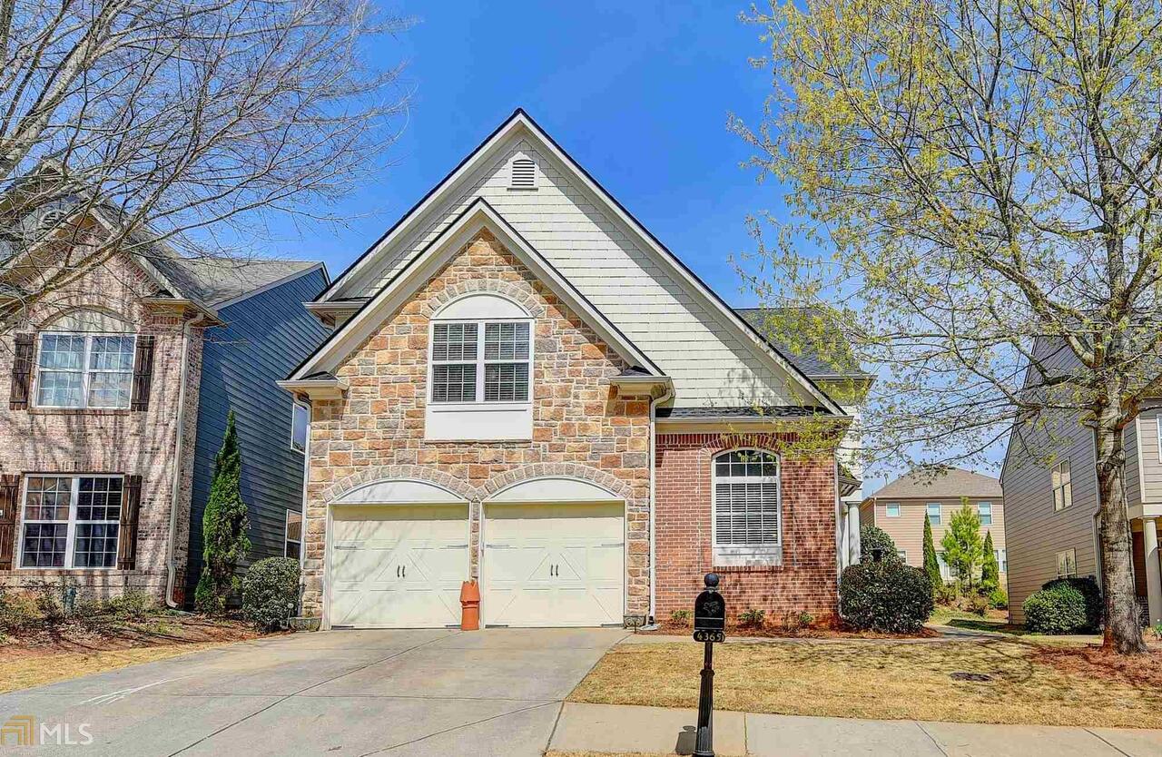 Amazing James Creek one owner home with stone & brick front; Covered front entrance welcomes you into this home that has a great open floor plan with soaring ceilings; Tons of natural light pours in from the front to back of home; New roof, New carpet, New hot water heater; Hardwoods on entire main floor; Eat-in kitchen offers an abundance of countertop space & has neutral stained cabinets; Dining area seats 12 easily and the great room offers a gas fireplace and access to the private backyard area. Beautiful oversized owner's suite on main floor has a double sinkvanity in bathroom, large tub & separate tiled shower plus a huge closet; The impressive curved wall and open staircase with iron balusters lead the way to the upstairs where there is a loft great as an office, playroom or exercise area; New neutral carpet throughout upstairs, 3 bedrooms & 2 full baths, one is an en-suite bath, walk-in closets; Upstairs laundry & large storage area. Exterior painted recently & there is new sod; James Creek has fantastic amenities, great schools and is close to shopping and Lake Lanier.