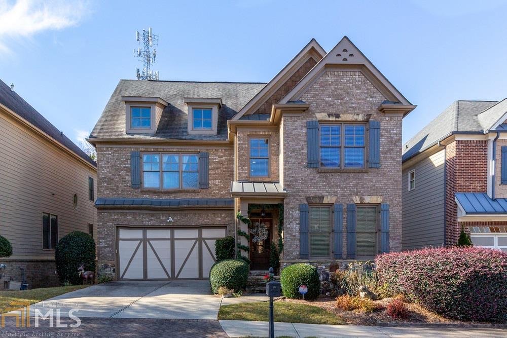 Come home to this GORGEOUS CERTIFIED EARTHCRAFT HOME in gated community. NEW ROOF COMING SOON! Enjoy this open floor plan with hardwoods on main level. Spacious kitchen with granite countertops and stainless appliances open to the great room. Escape to your Master on Main retreat with private access to deck. Soak in your garden whirlpool tub in the fabulous Master bath with his/her vanity areas. Large unfinished basement is a perfect canvas to design your own dream terrace level. Lots of storage! Great location to Suwanee Town Center and Downtown Duluth! Easy access to 85.
