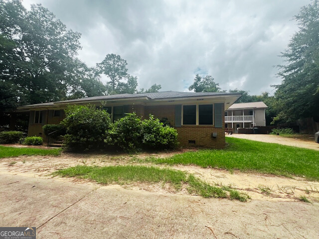There are 2 homes here. The sqft advertised is the total of both. The brick home has 3 bedrooms, 2 baths, and 1672 sqft. The 2-story is a 1-bedroom, 1.5 bath, and 1360 sqft. These are fixer-uppers and would make great rentals or, of course, your own home with a mother-in-law home as well. Many options here.
