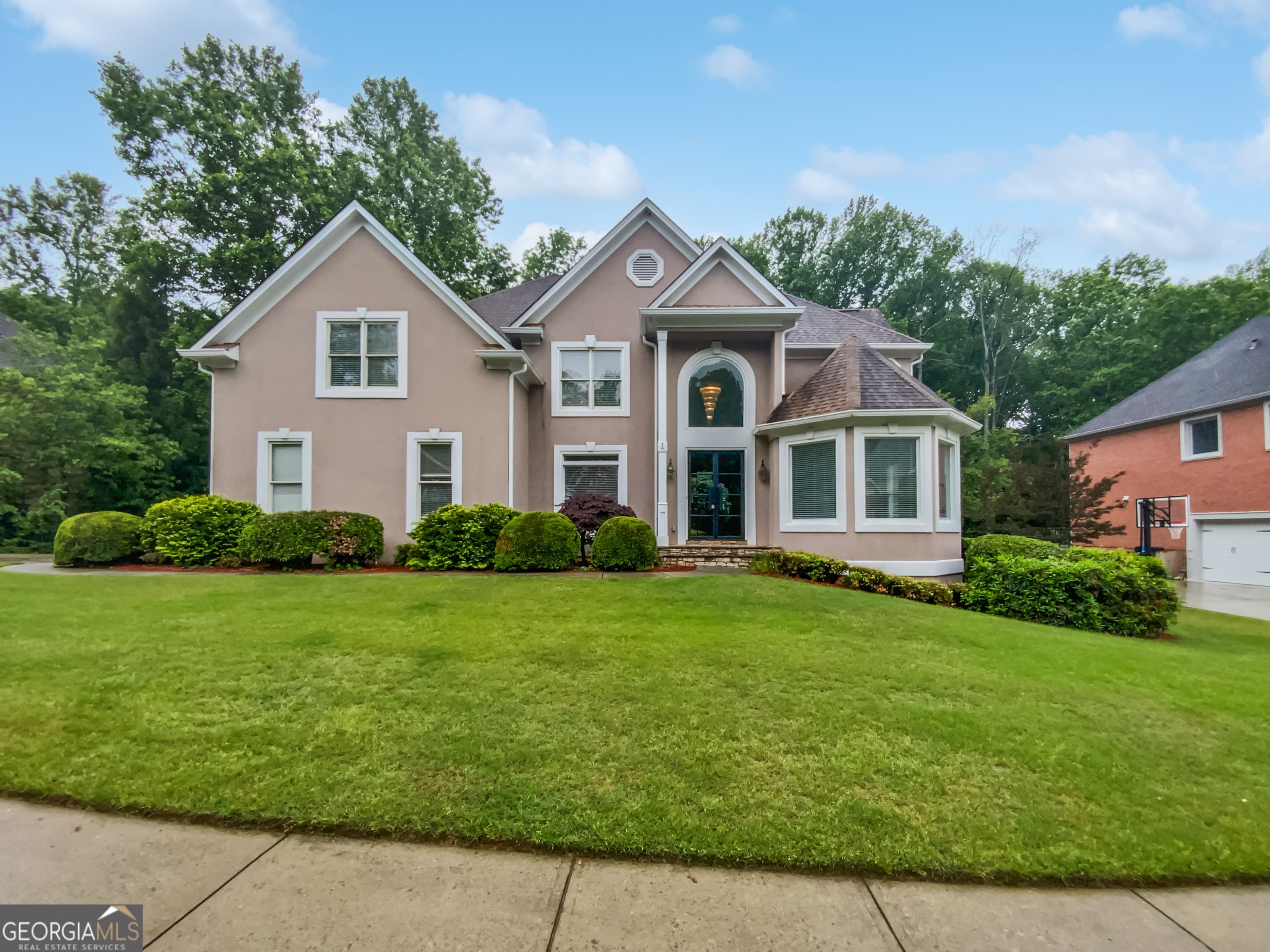 Welcome to this beautifully updated home featuring fresh interior paint and a warm, neutral color palette that sets the perfect backdrop for your personal style. The inviting living room includes a cozy fireplace, while the kitchen showcases a stylish backsplash, ample cabinetry, and a spacious walk-in pantry. Unwind in the primary suite, complete with a walk-in closet and a luxurious bath offering double sinks, a separate tub and shower, and generous under-sink storage. The backyard is ideal for relaxation with its private sitting area, perfect for entertaining or quiet evenings at home. Located in a highly sought-after area, this home offers unbeatable convenience to shopping, dining, businesses, and community activities. The basement provides plenty of room for expansion, making this property a fantastic opportunity you won't want to miss!