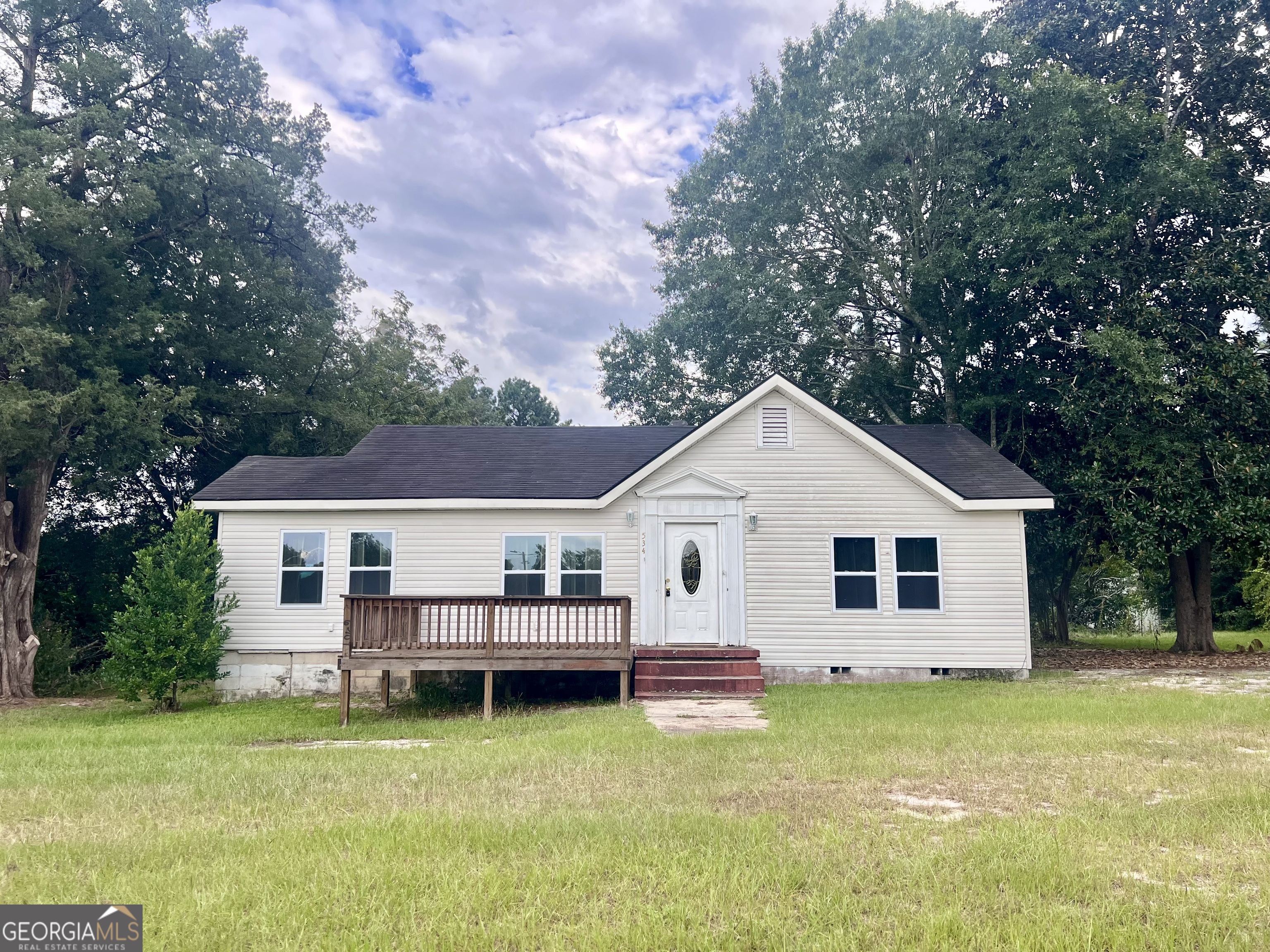 Discover this beautifully maintained duplex situated on a corner lot in Eastman, Georgia. This home offers comfort, style, and excellent rental income potential. Whether you're looking to live in one unit and rent the other or add to your investment portfolio, this property has it all! Unit 1 - 2 Bed / 2 Baths (approximately 1300 square feet) * Spacious open floor plan * Modern kitchen with black appliances * Sleek, modern bathroom * Durable and stylish LVP flooring * Private patio for outdoor relaxation Unit 2 - Studio / 1 Bath (Approx. 700 Sq Ft) * Bright and open studio layout * Fully equipped kitchen with stainless steel appliances * Sleek, modern bathroom * Perfect for short or long-term rental or for guests Conveniently located near Middle Georgia College School of Aviation, shopping, and schools. With its desirable location and move-in-ready condition, this duplex is perfect for homeowners, student housing investors, or short-term rental operators. Don't miss this unique opportunity to own this versatile property.