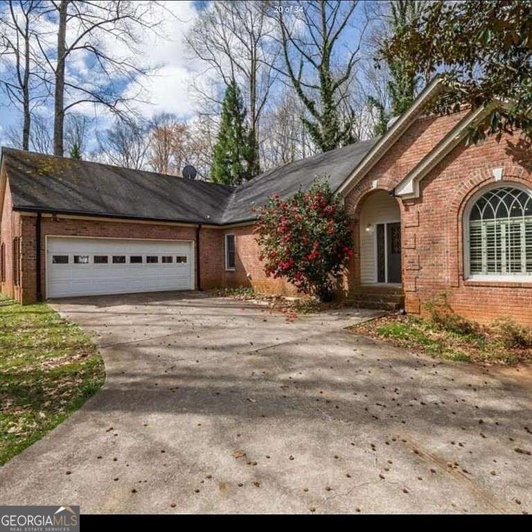 Photo of 5035 Hamptons Club Drive, Alpharetta, GA 30004 (MLS # 10876903)