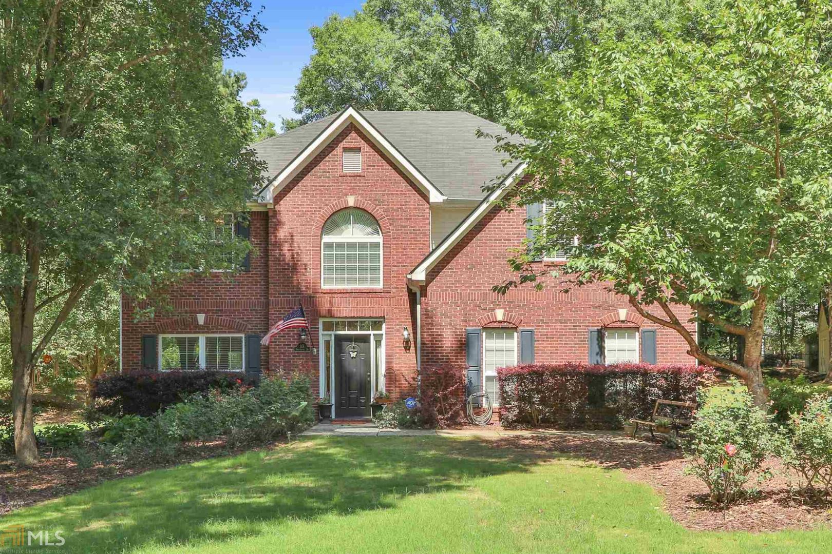This is a Spectacular 4Bedroom/2.5 Bath Two Story home on 1 Acre Lot in desirable Fayetteville High School District. It has Beautiful Hardwood Floors on the Main, A Master Suite with Newly Remodeled Bath with His & Her walk In closets. In Fact, all Bathrooms & Laundry Room have been updated. The kitchen includes Granite Countertops, Stainless Appliances with Pantry. There's a Formal Dining Room, a breakfast area, Living room & Family/Great Room! This Home has an open Patio with Grilling Area and a Beautiful Private Backyard for entertaining. There's even a large Storage Shed for all your gardening needs. This home has also been updated with a RINNAI Tankless Water Heating System! It's convenient to all the shopping and dining Fayetteville has to offer. THE PROPERTY IS TWENTY MINUTES FROM THE AIRPORT, FIVE MINUTES FROM PIEDMONT FAYETTE HOSPITAL AND FIVE MINUTES FROM PINEWOOD STUDIOS!