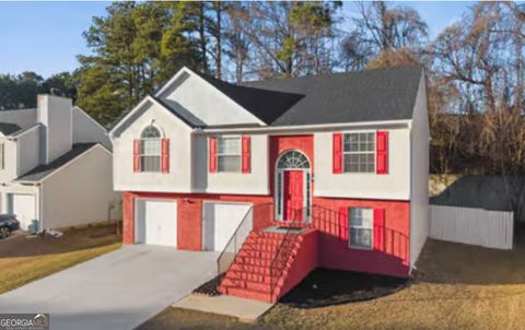 Photo of 1103 Hidden Brook Trail, Atlanta, GA 30349 (MLS # 10692948)