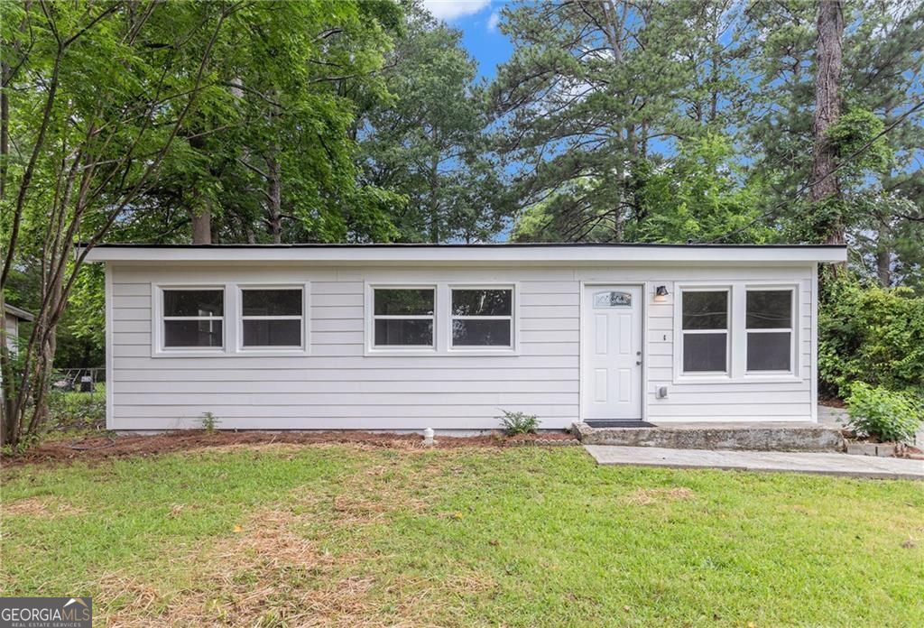 Beautifully Remodeled and Move-In Ready 3BR Marietta Home! Live, work, or both! Just 0.2 miles from Kennesaw State University's Marietta campus, this pristine 3-bedroom, 1-bath home offers a rare blend of carefree comfort and live/work potential. The home is FULLY renovated from top to bottom-sellers started at the studs and installed brand new everything including all big-ticket items: NEW HVAC, NEW tankless water heater, NEW energy-efficient windows, NEW ROOF(!) and beautiful, durable NEW Hardiplank siding. They included the fun stuff, too with NEW stainless electric appliances, granite countertops, stylish LVP, recessed lighting, and beautiful new neutral-colored carpet. Located in one of the BEST areas near Marietta Square, Dobbins Air Force Base, and I-75, with access to top-rated schools and convenient local amenities, this property offers unbeatable lifestyle and location. Zoned Community Retail Commercial (CRC), the level 0.20-acre lot comes with no setback restrictions, giving you the flexibility to operate a business, home-based office, boutique retail space, or simply enjoy a live/work lifestyle. CRC zoning supports a wide range of uses-from offices, salons, and health services to retail, gyms, and cafes-while still allowing residential occupancy. Whether you're a first-time homebuyer, entrepreneur, or investor, this unique property offers the chance to thrive both professionally and personally in one of Marietta's most desirable and dynamic locations.