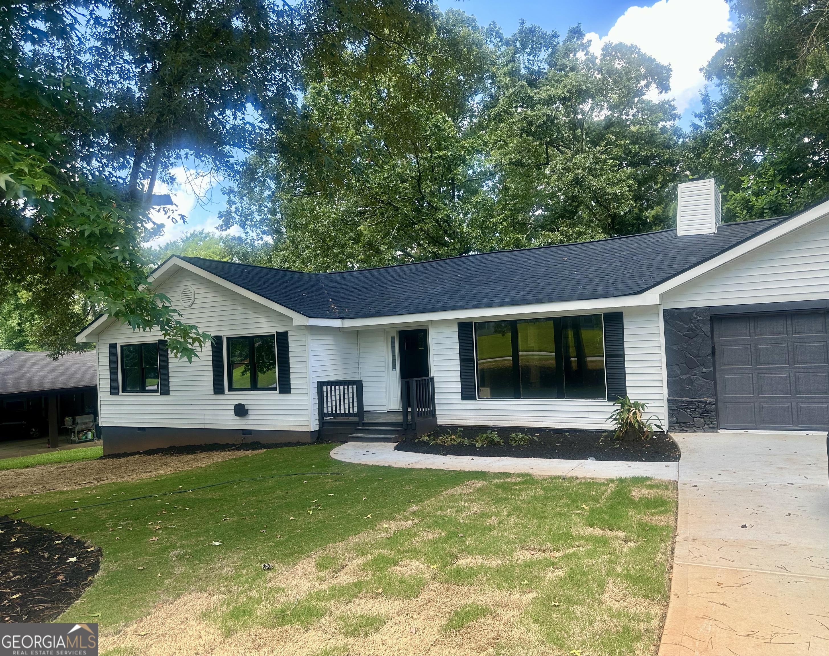 Fully Renovated 3-Bed, 2-Bath Ranch with New Roof, Porch & Appliances! Welcome to this stunningly updated 3-bedroom, 2-bathroom ranch-style home, where every detail has been thoughtfully refreshed for modern living. Enjoy a brand-new roof, new driveway, and a welcoming new front porch. Inside, the home features updated flooring, fresh interior paint, modern lighting, and a bright open layout. The kitchen comes equipped with brand-new appliances, perfect for any home chef. Step out back to a spacious deck, ideal for entertaining or relaxing. This move-in ready home blends style, comfort, and peace of mind. Don't miss your opportunity to make it yours!