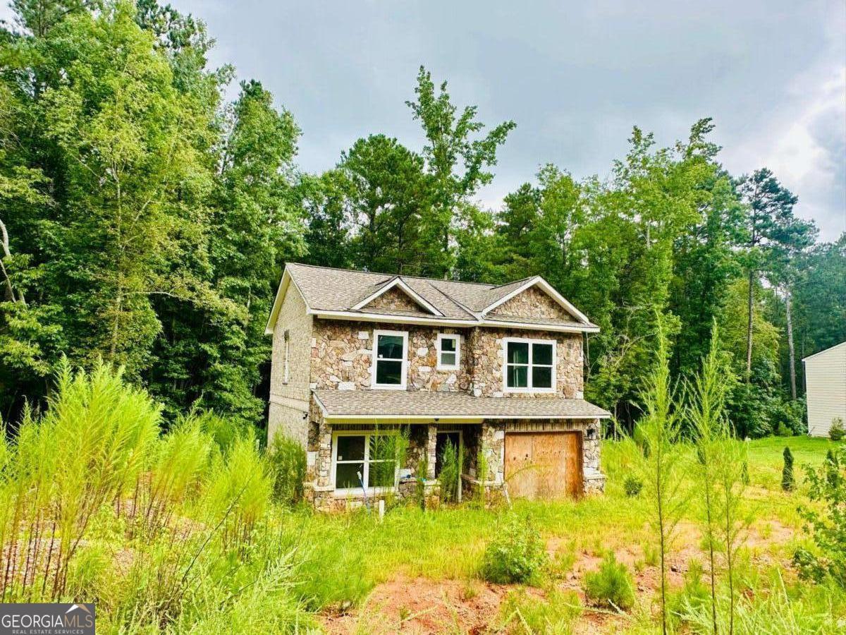 Located in the heart of Clarke County, this newly constructed property offers the perfect blend of peace and convenience. Just minutes from downtown Athens, the University of Georgia, and with quick access to Loop 10, it's ideally positioned to enjoy everything the city has to offer. The home is approximately 90% complete, with central air conditioning, a water heater already installed, and fresh interior paint. It only needs a septic tank, driveway, and kitchen cabinet installation to be move-in ready. Whether you're looking for a primary residence or an investment opportunity, this is an excellent investment property offering exceptional value in one of Athens' most desirable areas.