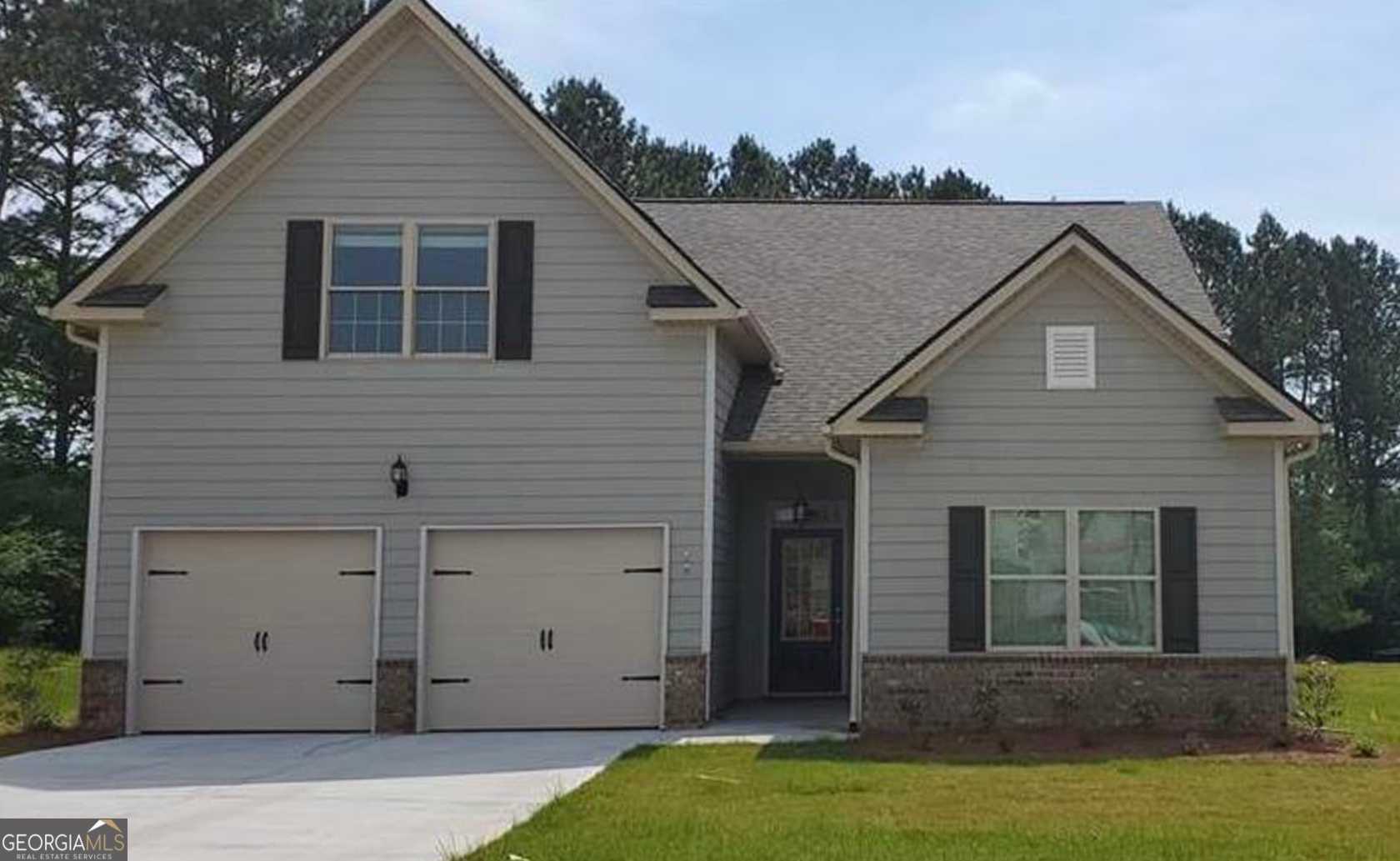 NEARLY NEW - The Woodbury Plan by PBG Homes in Killian Manor at The Adares is a well thought out and functional three bed, two and a half bath ranch with upstairs media room offering half bath. This plan features an impressive open concept with large windows in the main living area flooding the interior with natural light along with a generously sized eat in kitchen including sizable granite island for food preparation or presentation and plenty of additional countertop space, 42" cabinets with crown molding plus pantry! Primary suite offers dual vanities and large spa like tile shower with dual shower heads, dual rain showers and tile seat. The upstairs media room offers functional flex space to use as an office or a guest room to name a few options. Tree lined back yard offers privacy as you relax under your covered back porch with farm pasture beyond. The neighborhood Clubhouse offers space for entertaining, relaxation while you send kids off to the playground or pool for endless fun or host your friends in the covered party pavilion! Finding home here also gives you some of the best of North Georgia life whether you enjoy exploring the outdoors or visiting locations in and around Rome, Calhoun and Cartersville for shopping and entertainment. Outdoor attractions range from hiking and equestrian trails to resort -style luxury at Barnsley Resort. Meanwhile it's easy to visit shopping centers in nearby areas thanks to I -75 and local highways. Only 3 miles from historic downtown Adairsville with restaurant offerings ranging from Southern comfort foods, to crowd pleasing pizza and world cuisine restaurants along with cafes and coffee shops to perk up your day. Sold new in 2023 for $358,361 this market leader is exceptionally well priced at under 280k - don't let this this rare value and lifestyle improving opportunity pass you by - make your move before someone else scoops up this winner!