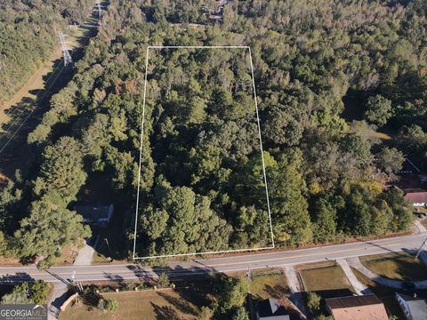 Photo of 829 E McIntosh Road, Griffin, GA 30223 (MLS # 10628271) Photo of 829 E McIntosh Road, Griffin, GA 30223 (MLS # 10628271)