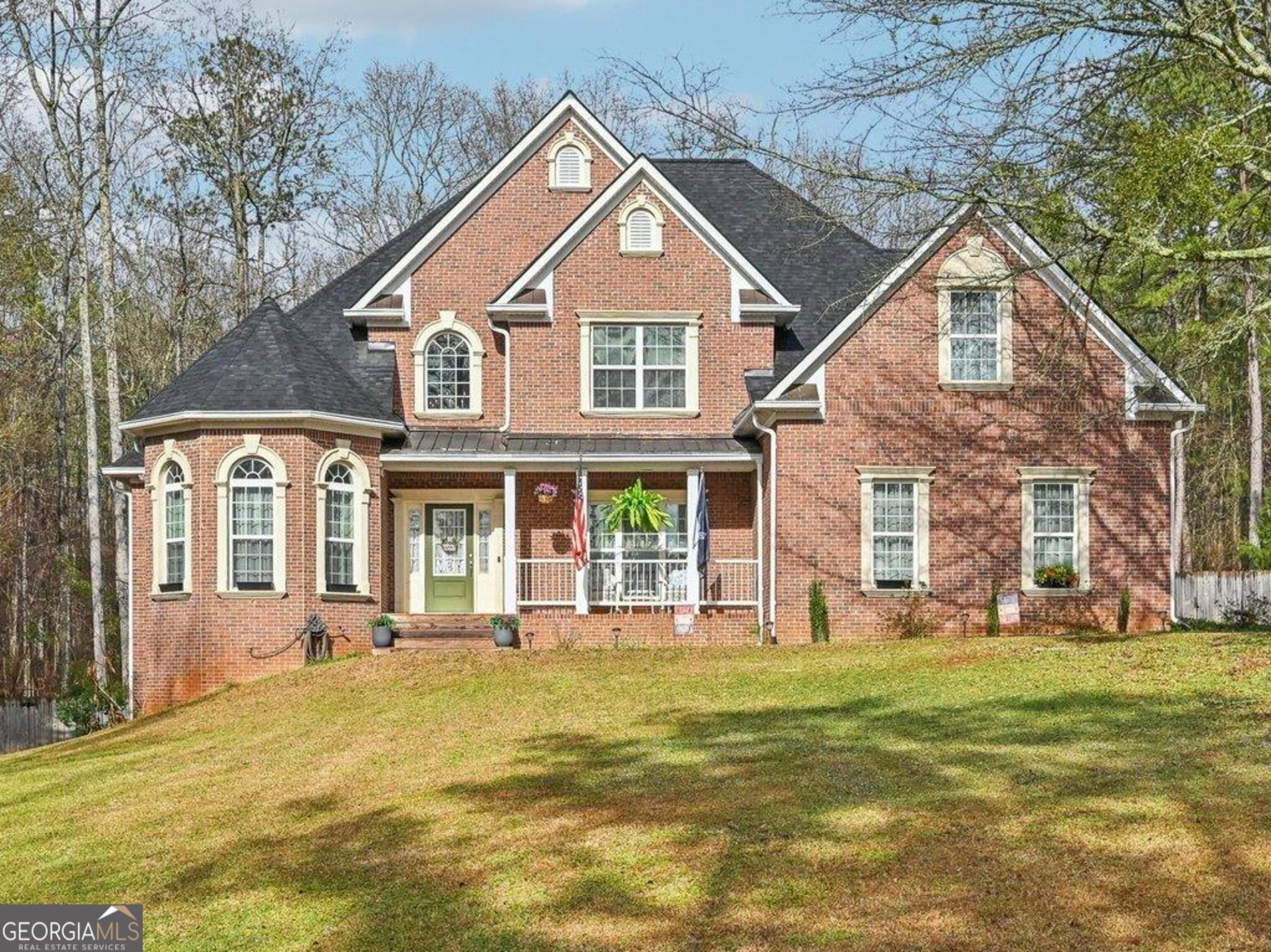 Motivated Seller - Serious Buyers, This One Has It All! A rare opportunity in the highly sought-after Harbour Shores community! This 4-sided brick home on 2.66 private acres blends elegance, comfort, and stunning lake views into the perfect retreat. With brand new carpet upstairs and refinished hardwoods downstairs, this home is move-in ready and filled with upgrades that add instant value. Inside, you'll find 4 bedrooms, 3.5 baths, and a layout designed for both everyday living and entertaining. The open-concept kitchen is equipped with granite countertops, stainless steel appliances, a spacious island, and abundant cabinetry. Three fireplaces add warmth and charm throughout. The oversized master suite delivers a spa-like experience with dual sinks, soaking tub, separate shower, and a generous walk-in closet. Secondary bedrooms feature ample storage and a Jack-and-Jill bathroom for convenience. Need space to work or create? The bonus room is ready for your home office with high-speed Starlink internet. The fully finished basement adds even more flexibility - complete with a private entrance, full bath, kitchenette, built-in bar, and additional living space. Perfect for an in-law suite, extended family, or entertainment zone. Step outside to your backyard oasis featuring an in-ground saltwater pool, a new covered gazebo with ceiling fan, and a furnished patio ideal for summer nights. For storage or projects, you'll love the 47'x14' wired boat garage/workshop, 10'x12' lofted storage shed, and oversized two-car garage. And the extras? This home comes with an Outdoor Equipment Package including a John Deere X330 Lawn Tractor, 25-ton log splitter, 2022 pull-behind trailer, plus a brand new 28' Blackstone griddle with cover - the ultimate setup for backyard entertaining. This is more than just a house. It's a lifestyle, and it's move-in ready today. Take the virtual tour now, then call to schedule your private showing before this Harbour Shores gem is gone!