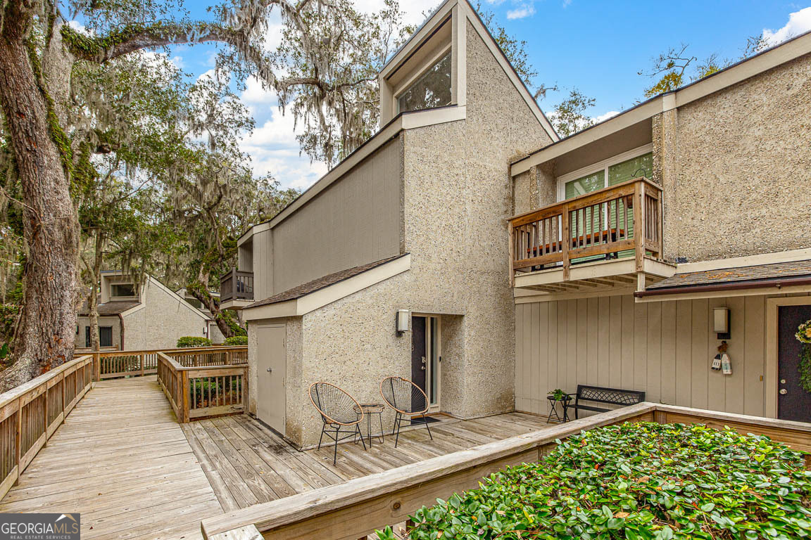 Welcome to your completely renovated retreat in the heart of the desirable Sea Palms community! This stunning condo at 413 Fairway Villas has been updated from top to bottom and is ready to impress. Every detail has been thoughtfully considered, including all-new furniture and finishes throughout, ensuring a fresh, modern feel with plenty of space to relax and entertain. This spacious home features two generously sized bedrooms, each with its own private en-suite bathroom, offering ultimate comfort and privacy. An additional half-bath is a bonus for guests. The open-concept living and dining area flows seamlessly, perfect for hosting or unwinding after a day on the island. Located just a short stroll from the golf course, Sago restaurant, and Sea Palms' top-notch amenities, this condo offers the perfect blend of luxury and convenience. Whether you're seeking a full-time residence, a vacation getaway, or an investment property, this updated condo has it all. Experience the Sea Palms lifestyle and make 413 Fairway Villas your new island escape today!
