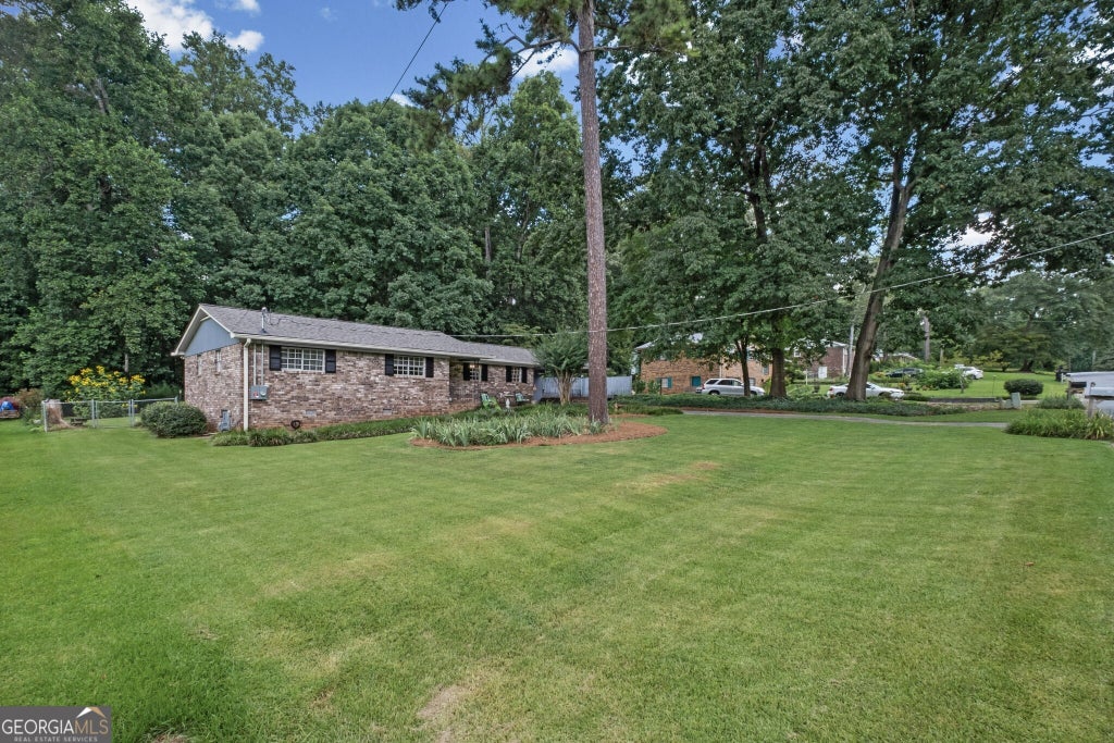 Photo of 1050 Castlewood Drive, Woodstock, GA 30189 (MLS # 10813100)