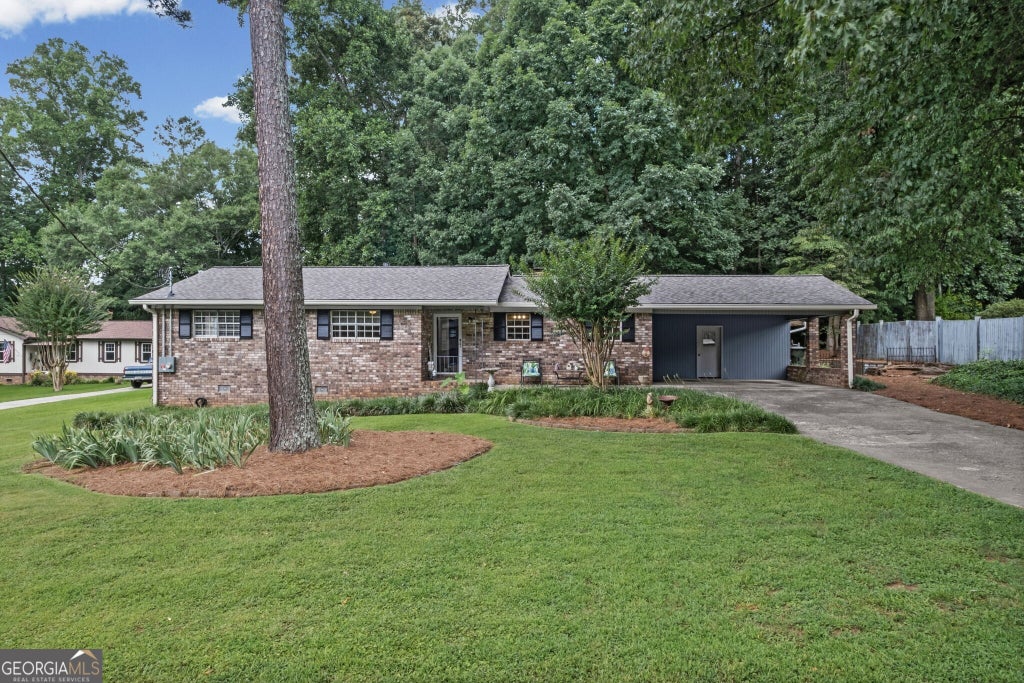 Photo of 1050 Castlewood Drive, Woodstock, GA 30189 (MLS # 10813100)
